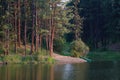 Canoe Resting on Remote LakeÃ¢â¬â¢s Shore Royalty Free Stock Photo